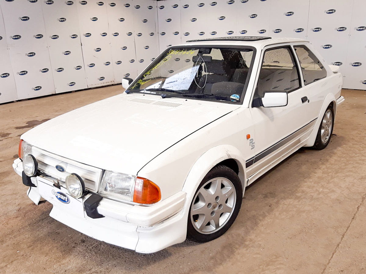 A White Ford Escort RS Turbo.