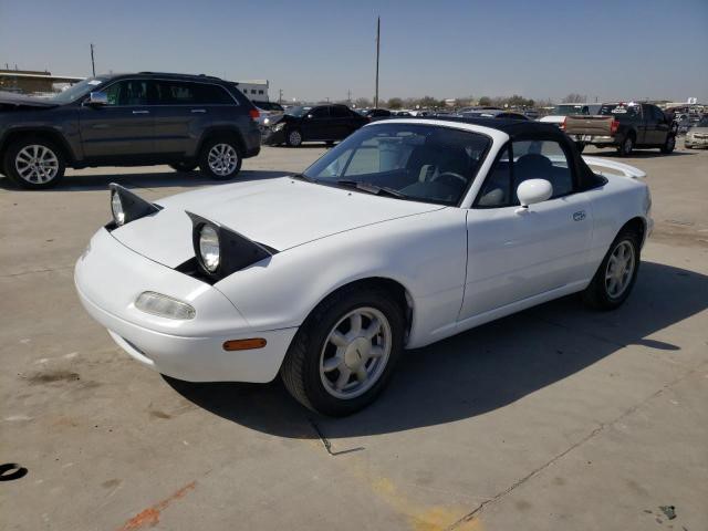 White Mazda MX-5 parked at a Copart site