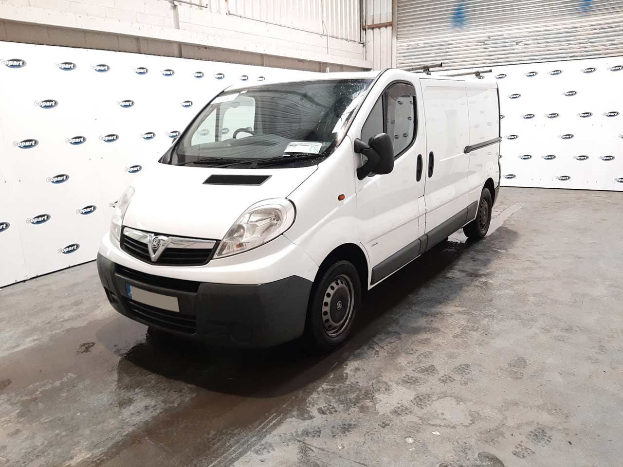 White Vauxhall Vivaro parked in a Copart lot