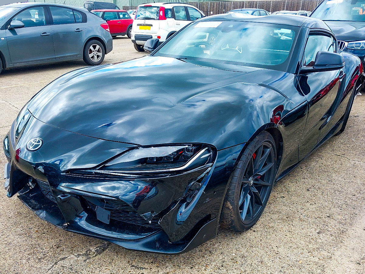 A black Toyota Supra.